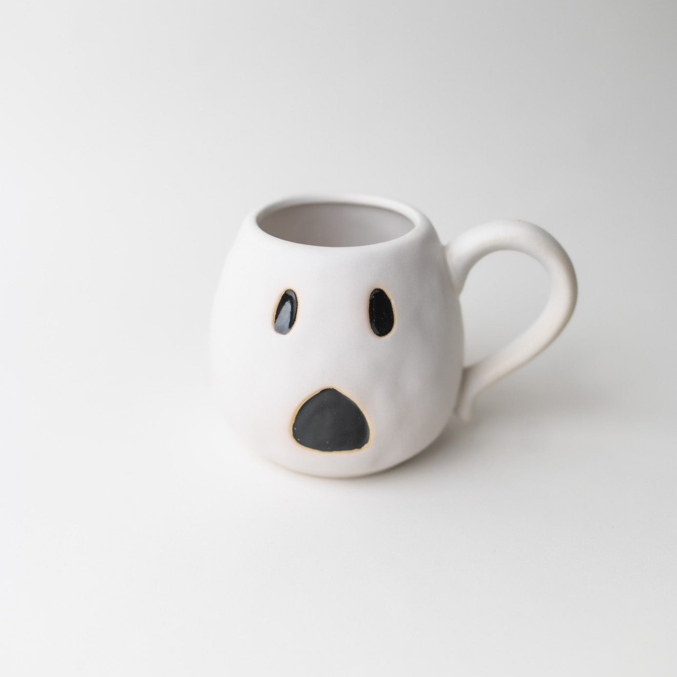 Debossed Stoneware Ghost Shaped Mug